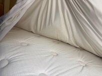 Yellowing/stains on bed and bedding material