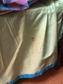 Blood stain on bed skirt