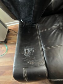 Detached armrest on the sofa