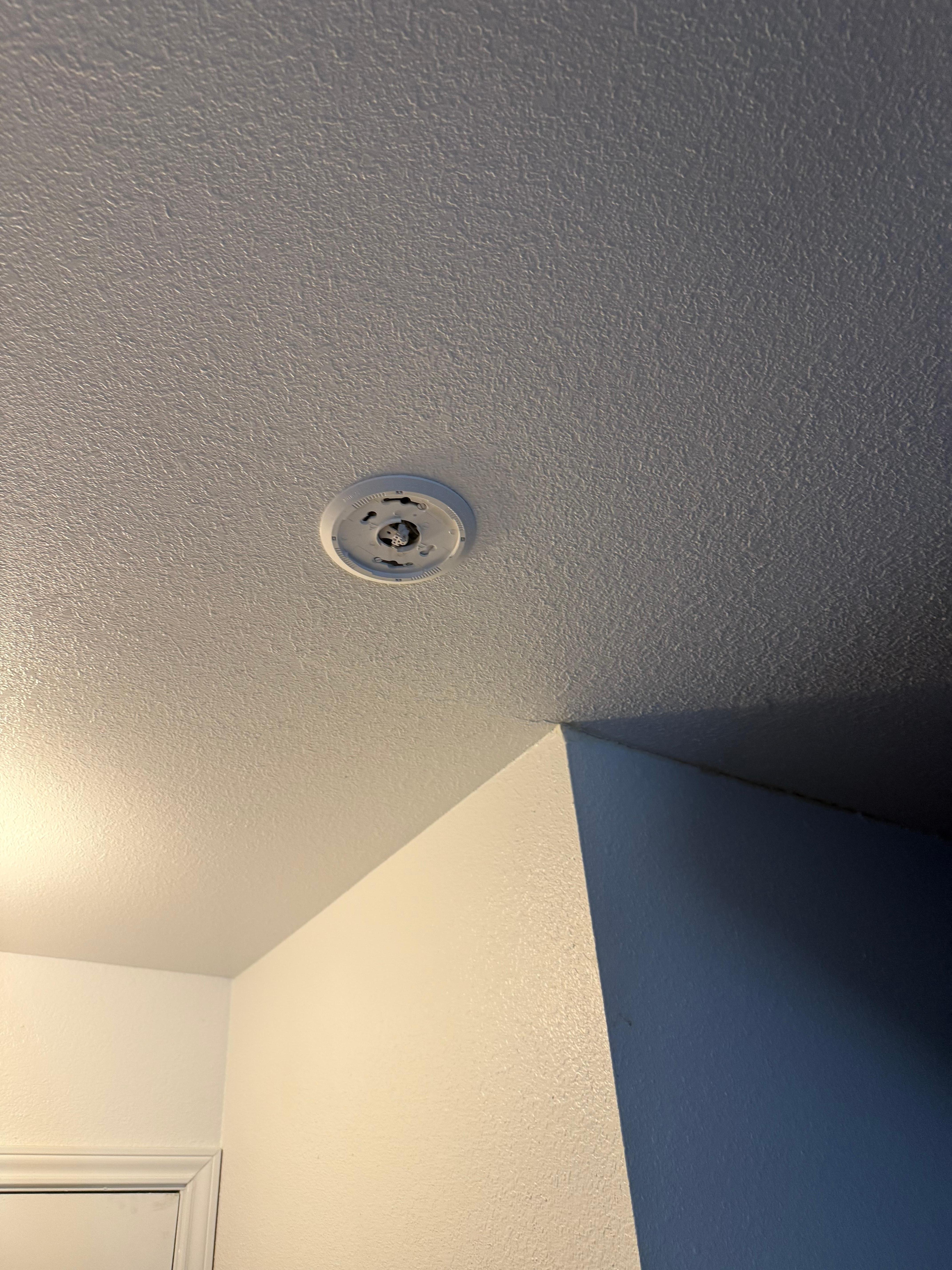 A lot of smoke alarms look like they used to be there, but not hooked up.