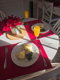 Anniversary breakfast in the cottage. Beautiful little side porch we ate in. Evening fire pit was nice too.