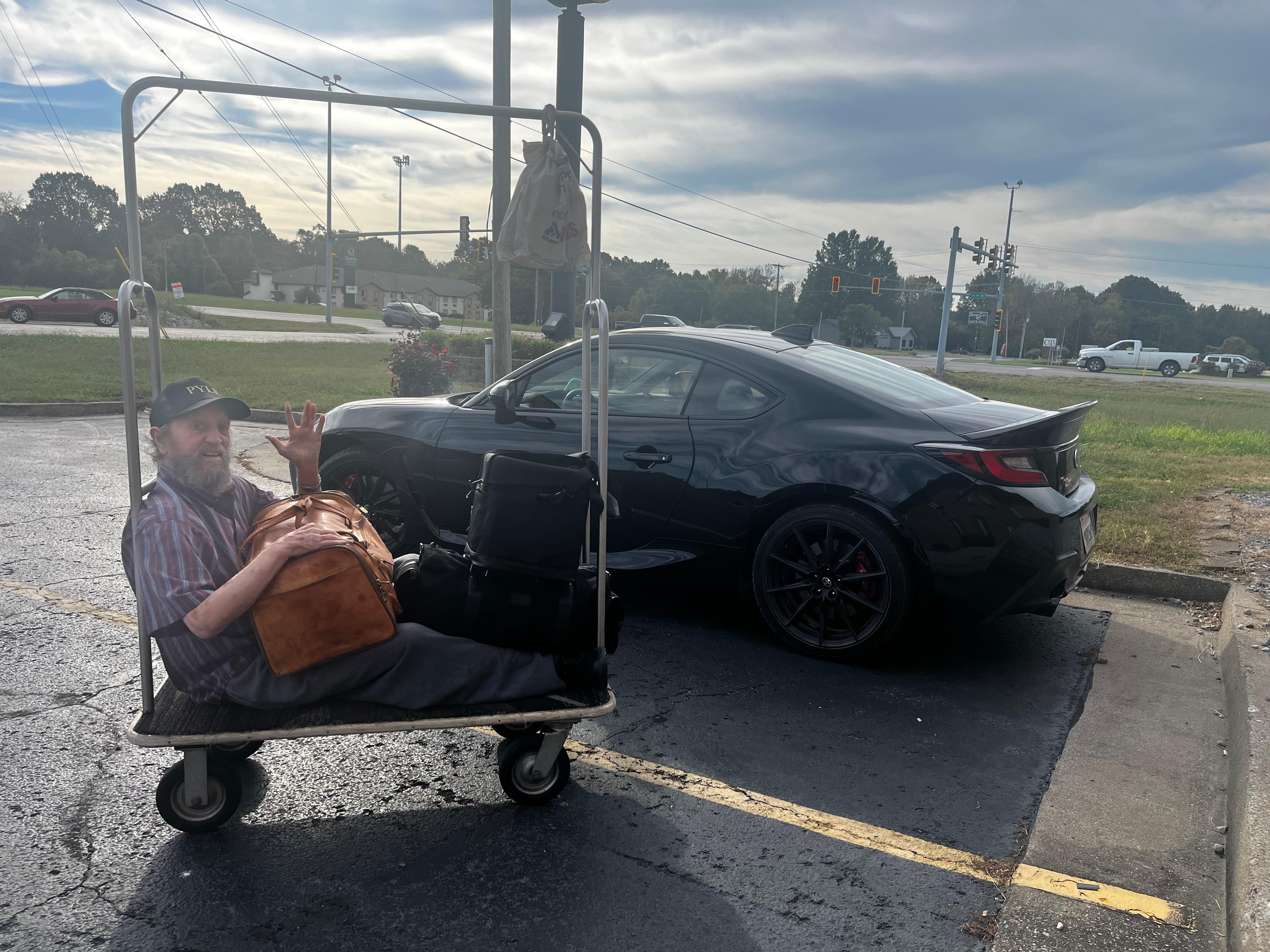 My pops on their luggage cart 🧳