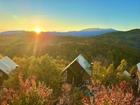 Sunrise coming up over mountain. Taken from the lower deck.