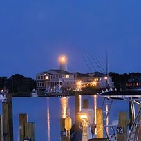 View of Ocracoke harbor and lighthouse from the Inn's swimming pool.