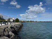 Hotel in the distance from the jetty beyond the marina