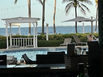 From the bar looking at the pool and ocean.