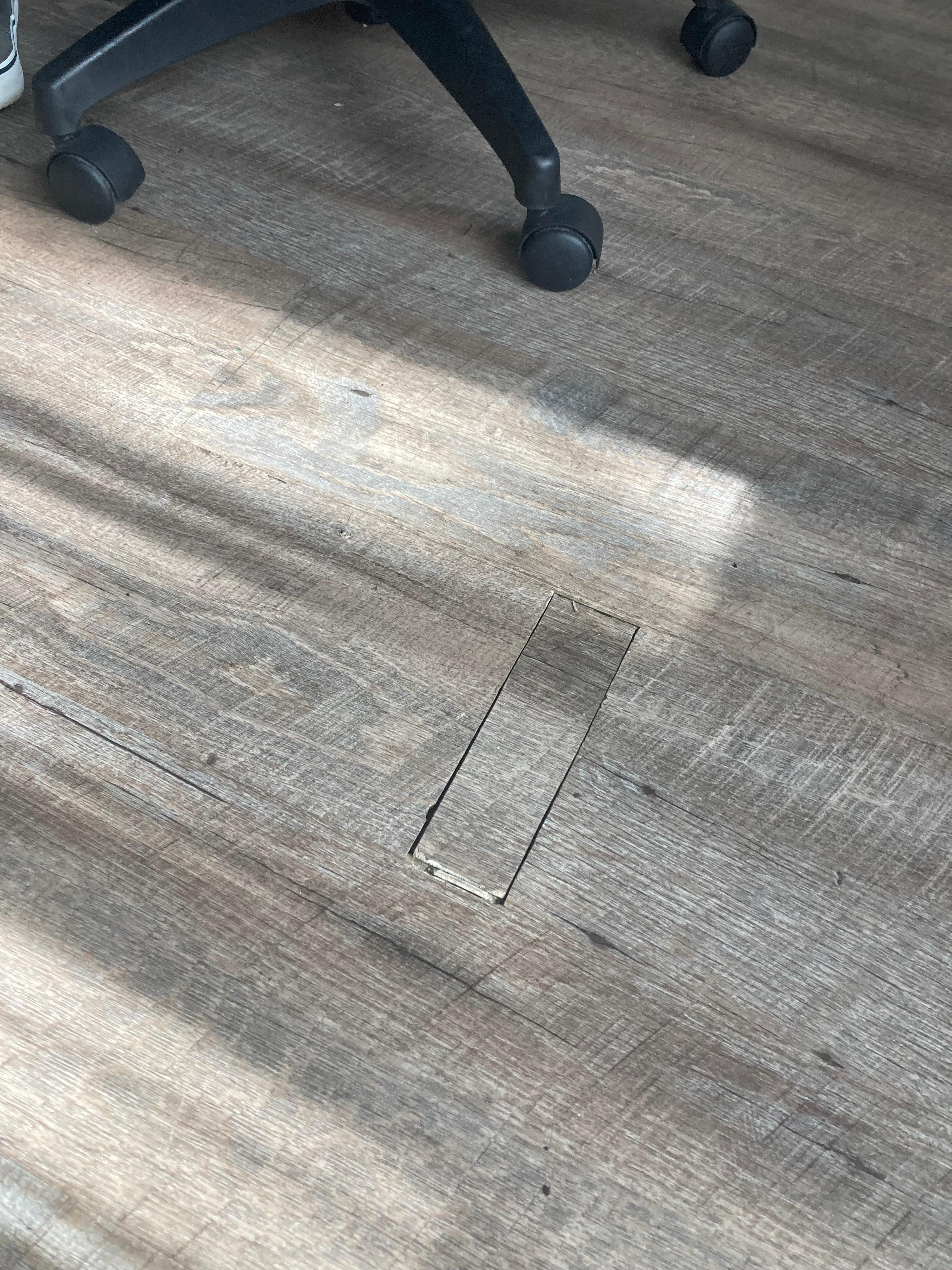 Chipped and patched flooring