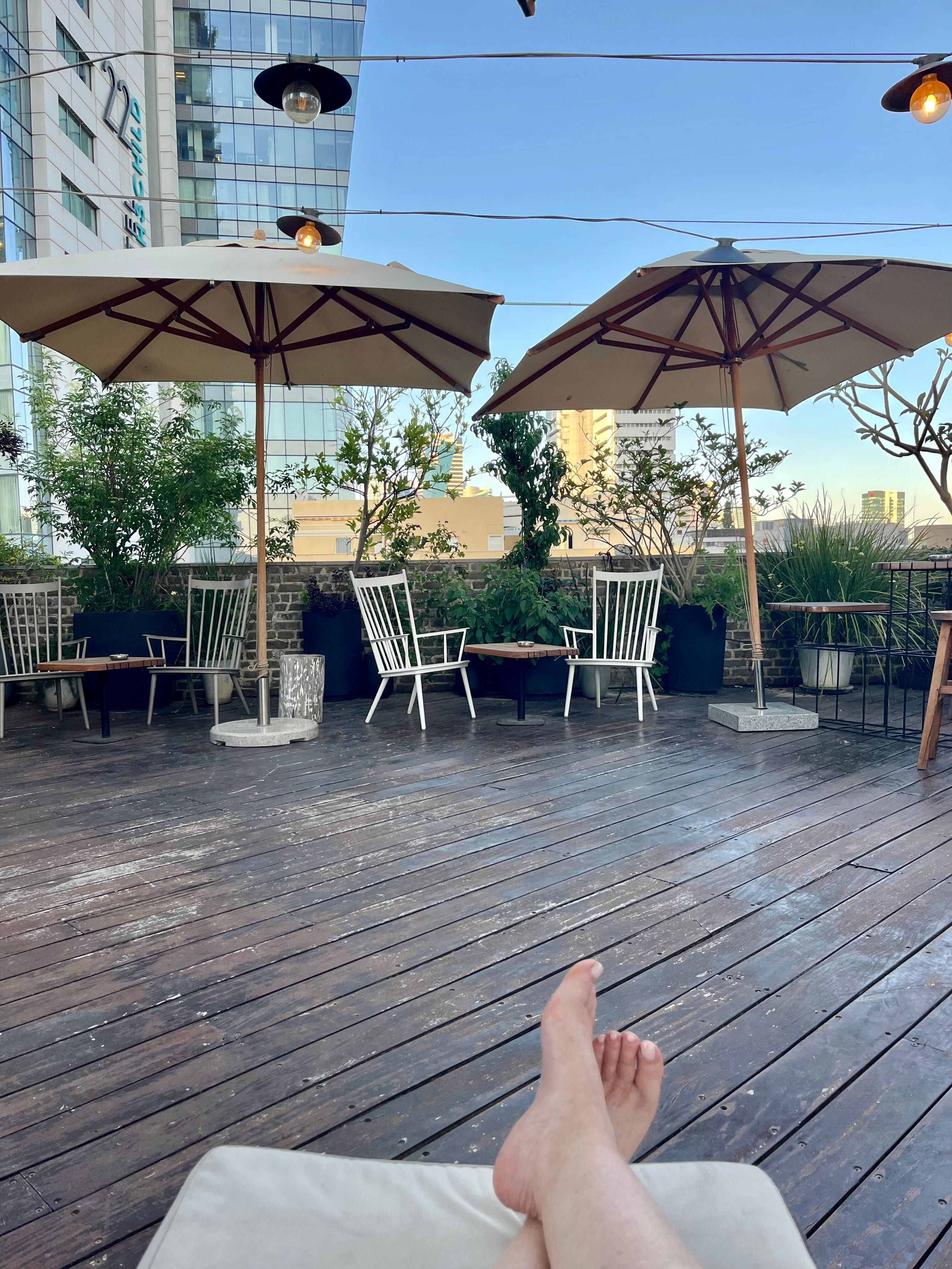 Enjoying relaxing hotel rooftop deck