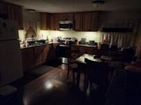 In the kitchen in the dark, wee hours of the morning to brew a cup of tea.