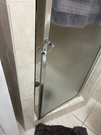 Broken handle in shower, door won’t close