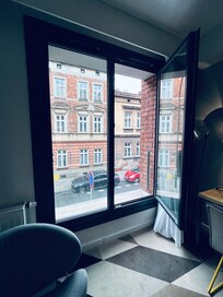 A large window which could be opened up to get fresh air in.