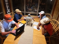 Chapter Planning meeting at the dinner table.