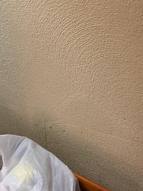 Coffee maybe dried on the wall