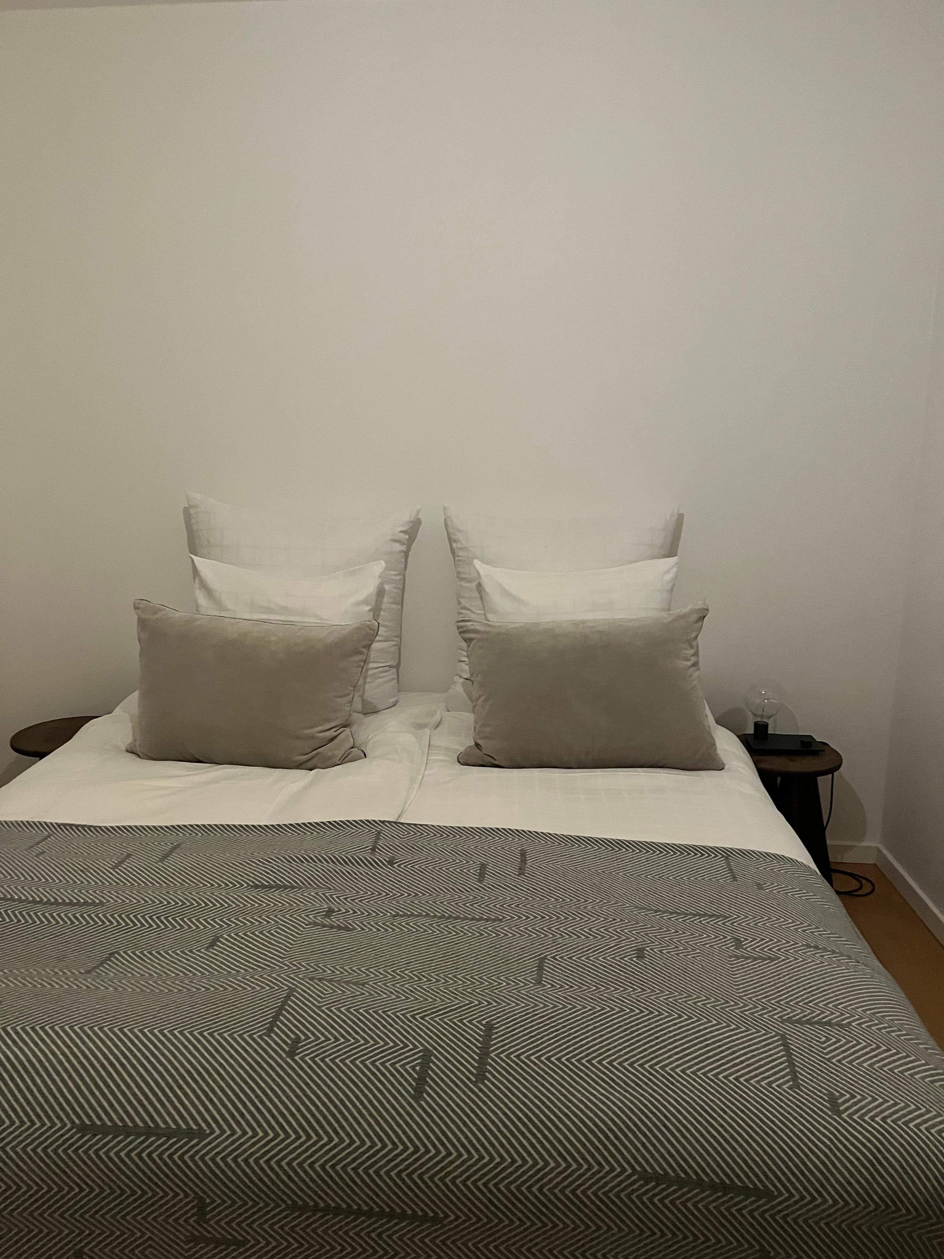 6 pillows on the bed! Simply decadent.