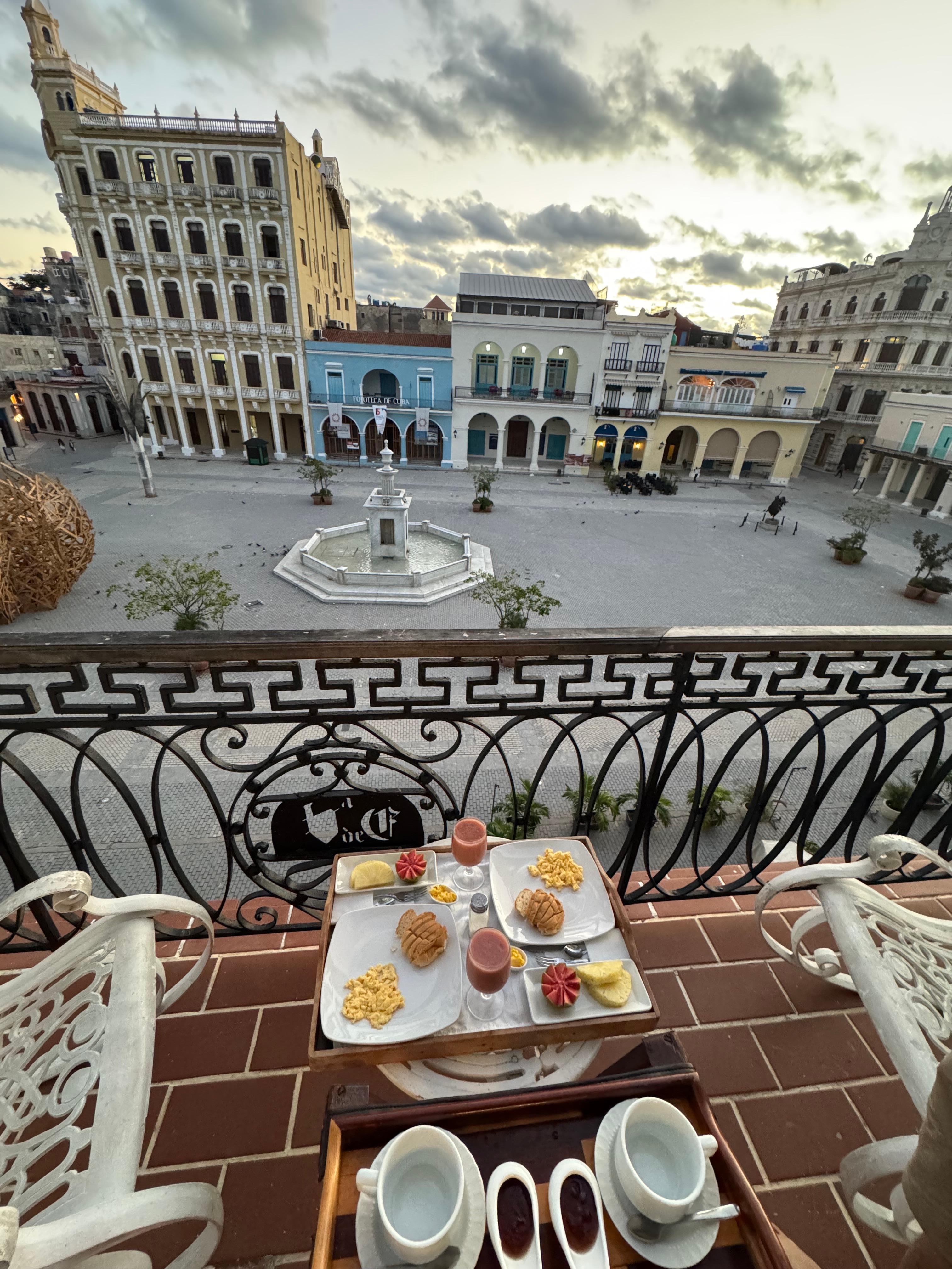 Breakfast in balcony on old town square 