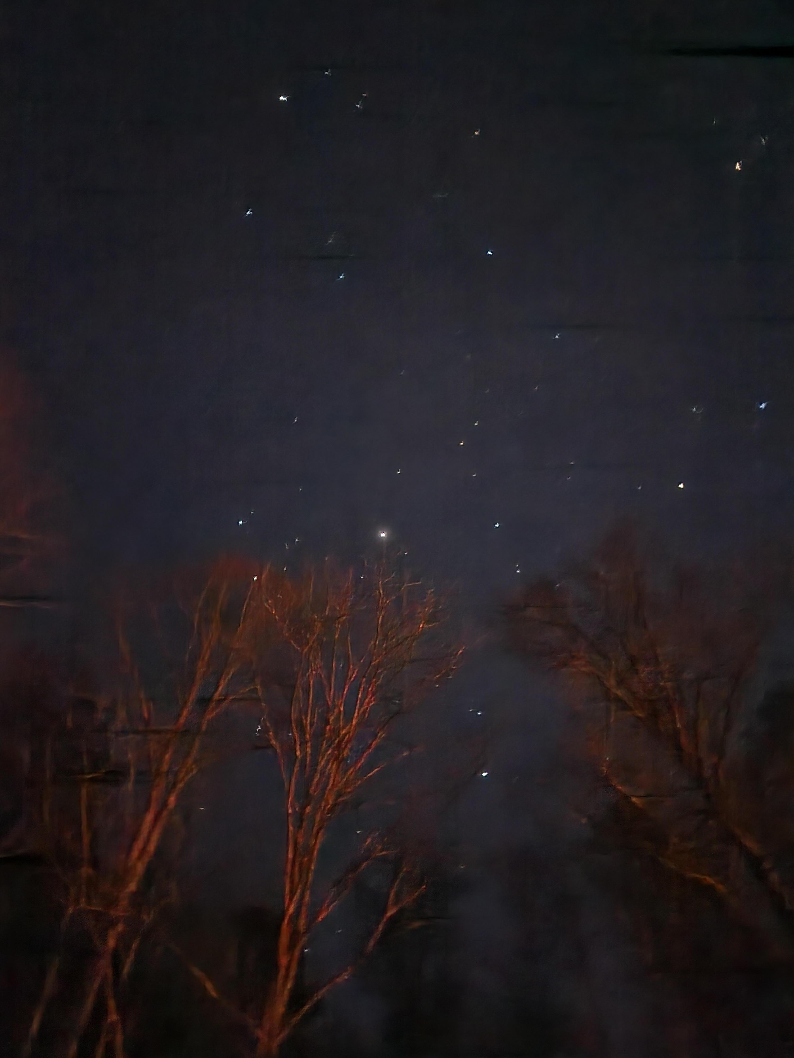 Sitting at the fireplace looking at the night sky