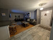 Living room area upon entering the front door.