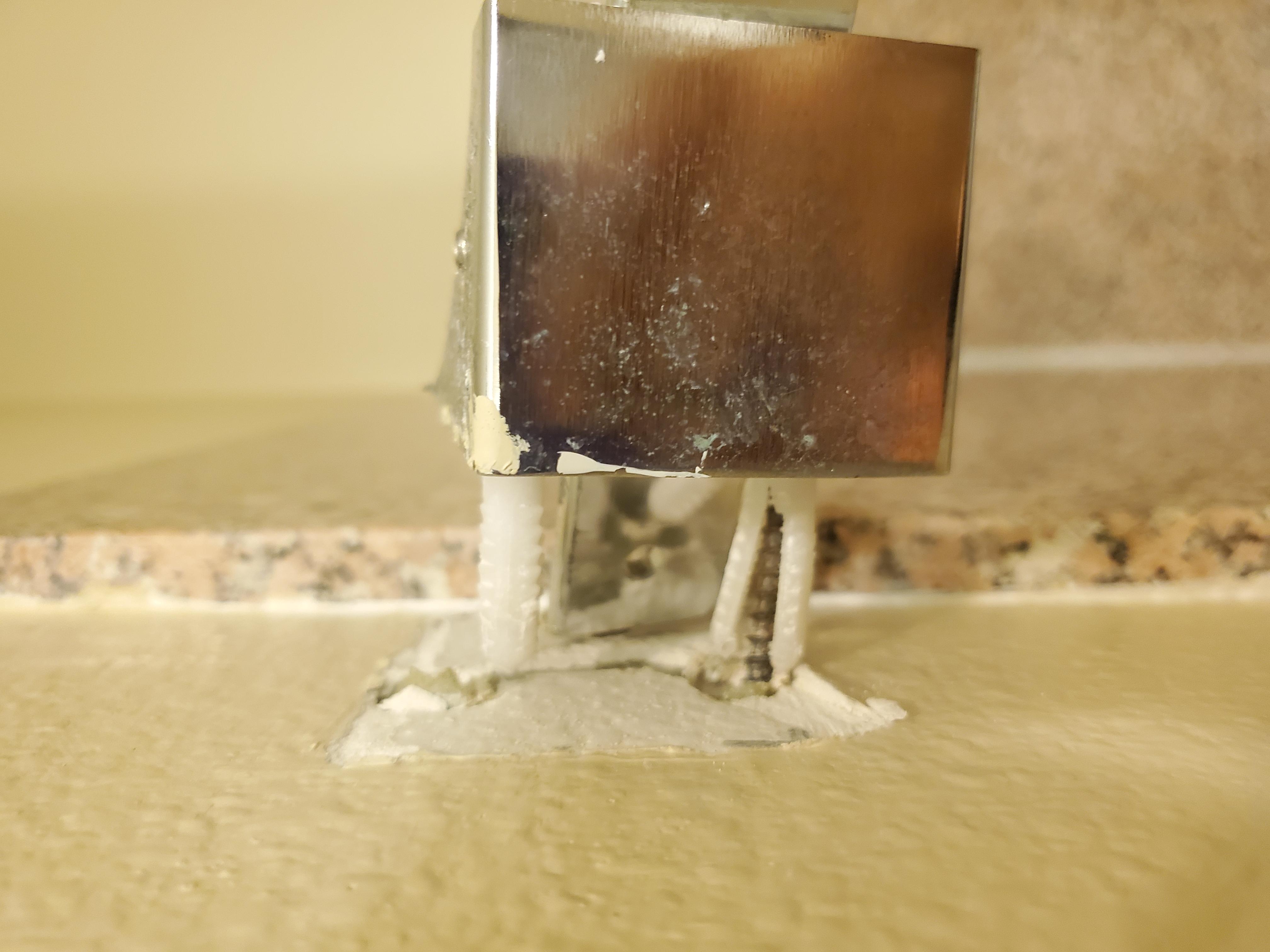 Shower curtain rod coming out of the wall but they did fix while we were there