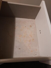 Looks like someone had been sick in the drawer by bed