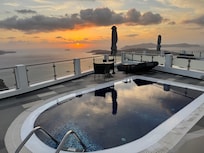View from our upper patio down to the private balcony with heated pool.