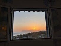 The view of the sunrise from the main bedroom window.