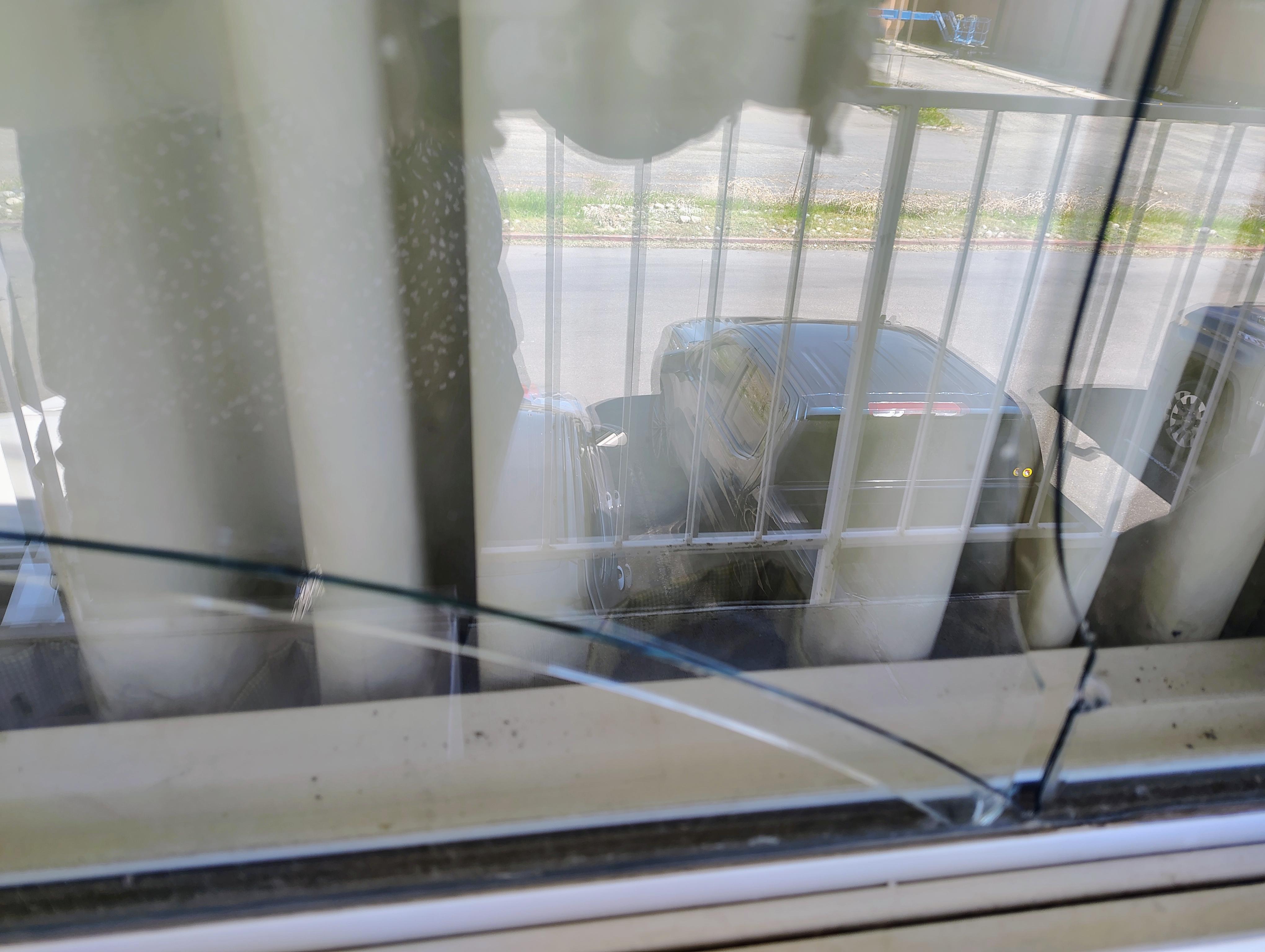Exterior pane of a double paned window shattered