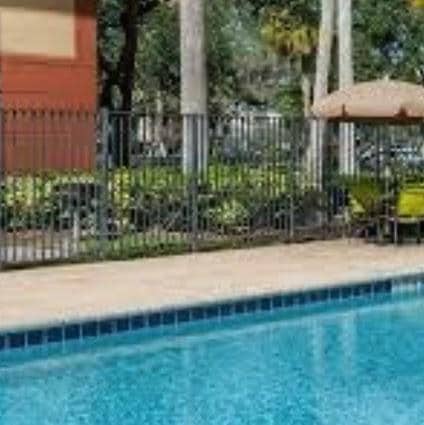 Relaxing by the pool need for checking out