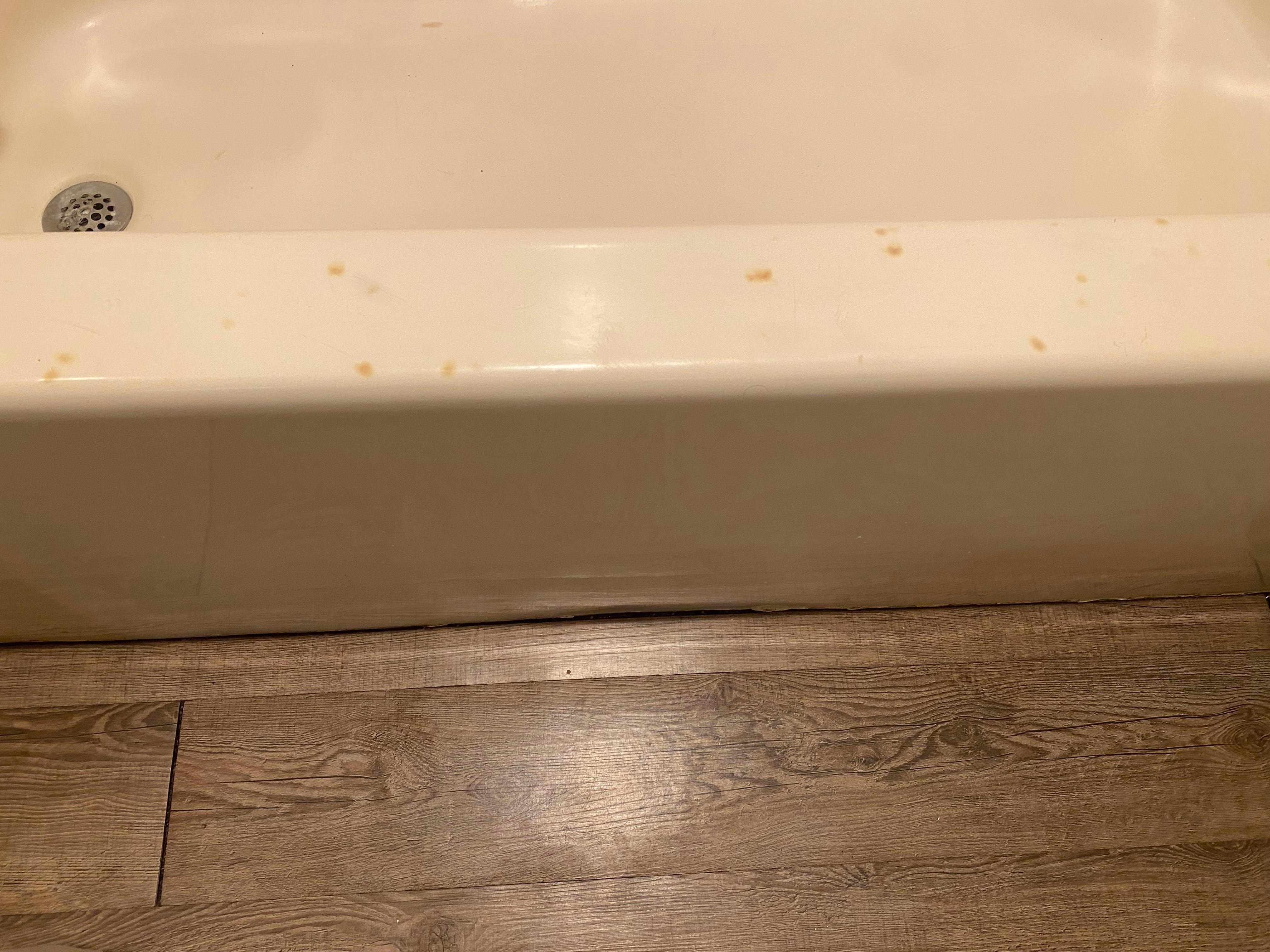 Cigarette burns on bath tub