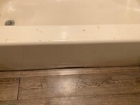 Cigarette burns on bath tub