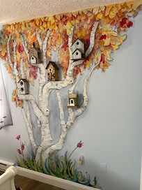 My favorite decoration, the birdhouse tree in the master bedroom