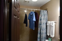The shower... only place to hang clothes.