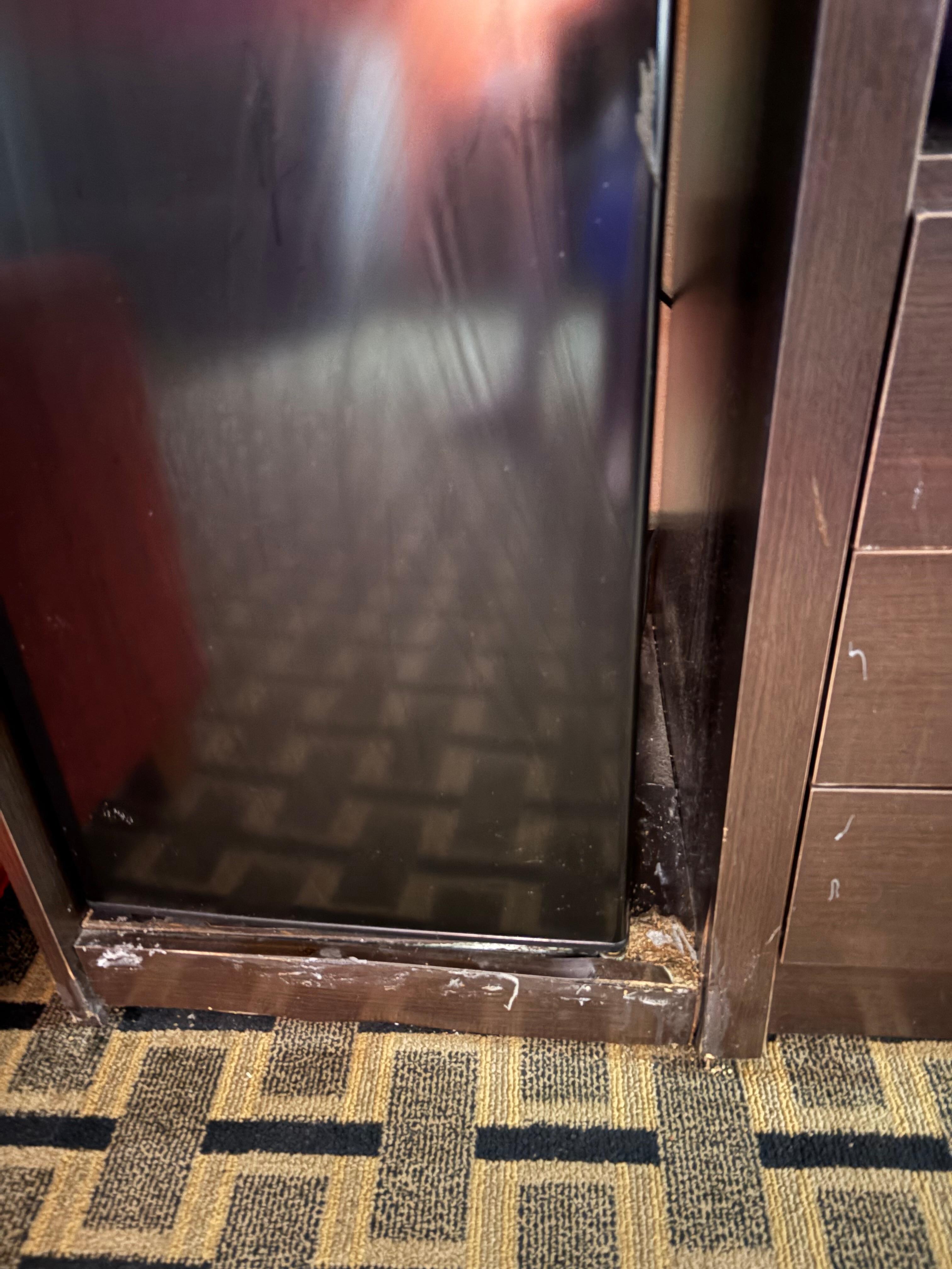 Mini refrigerator cabinet in room