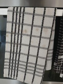Dirty tea towel left out on arrival