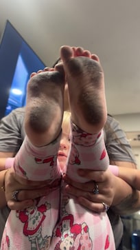 Two yr olds feet after walking on the floor