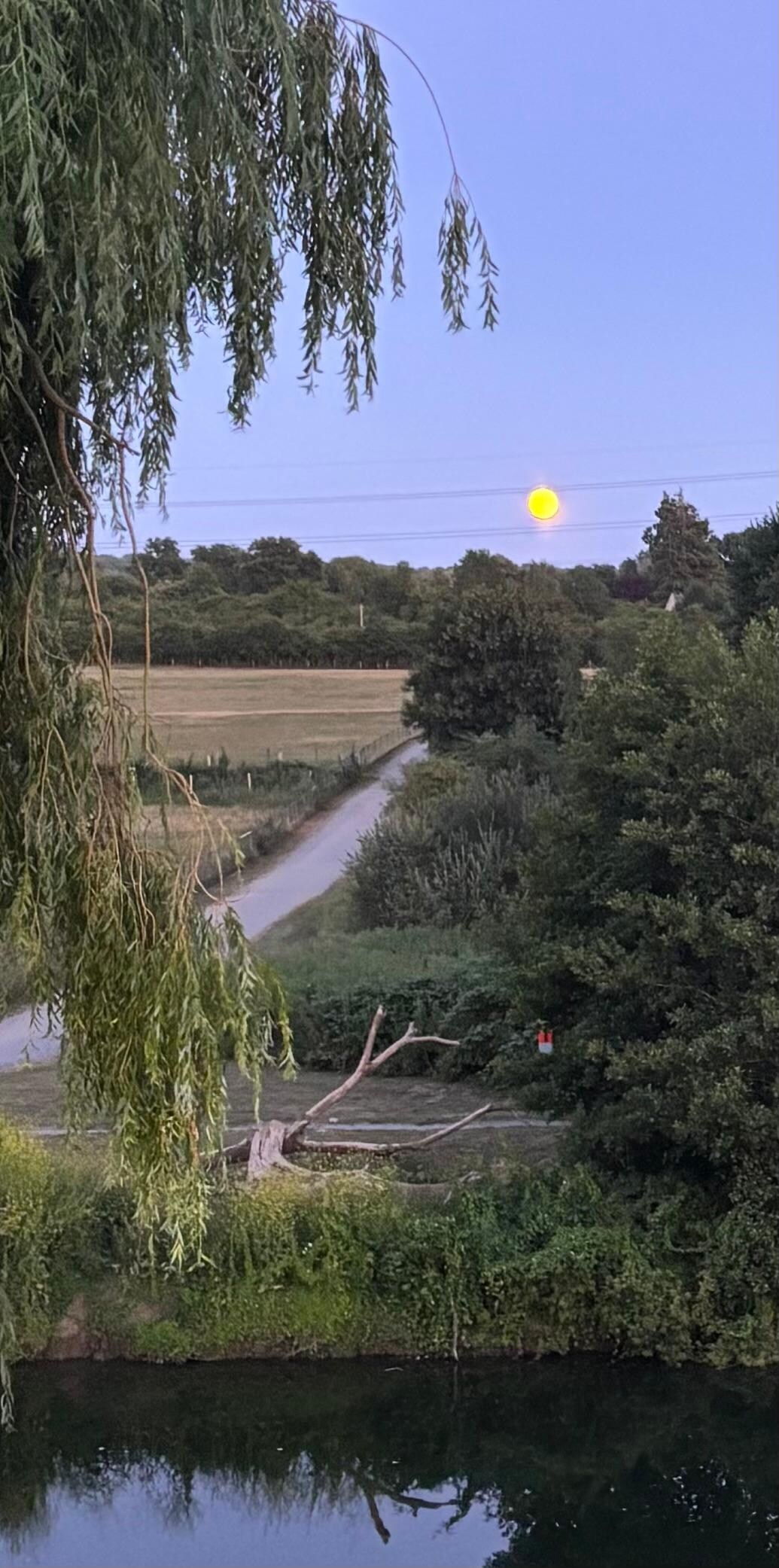 Moon over the idyllic countryside - taken from garden of hotel 