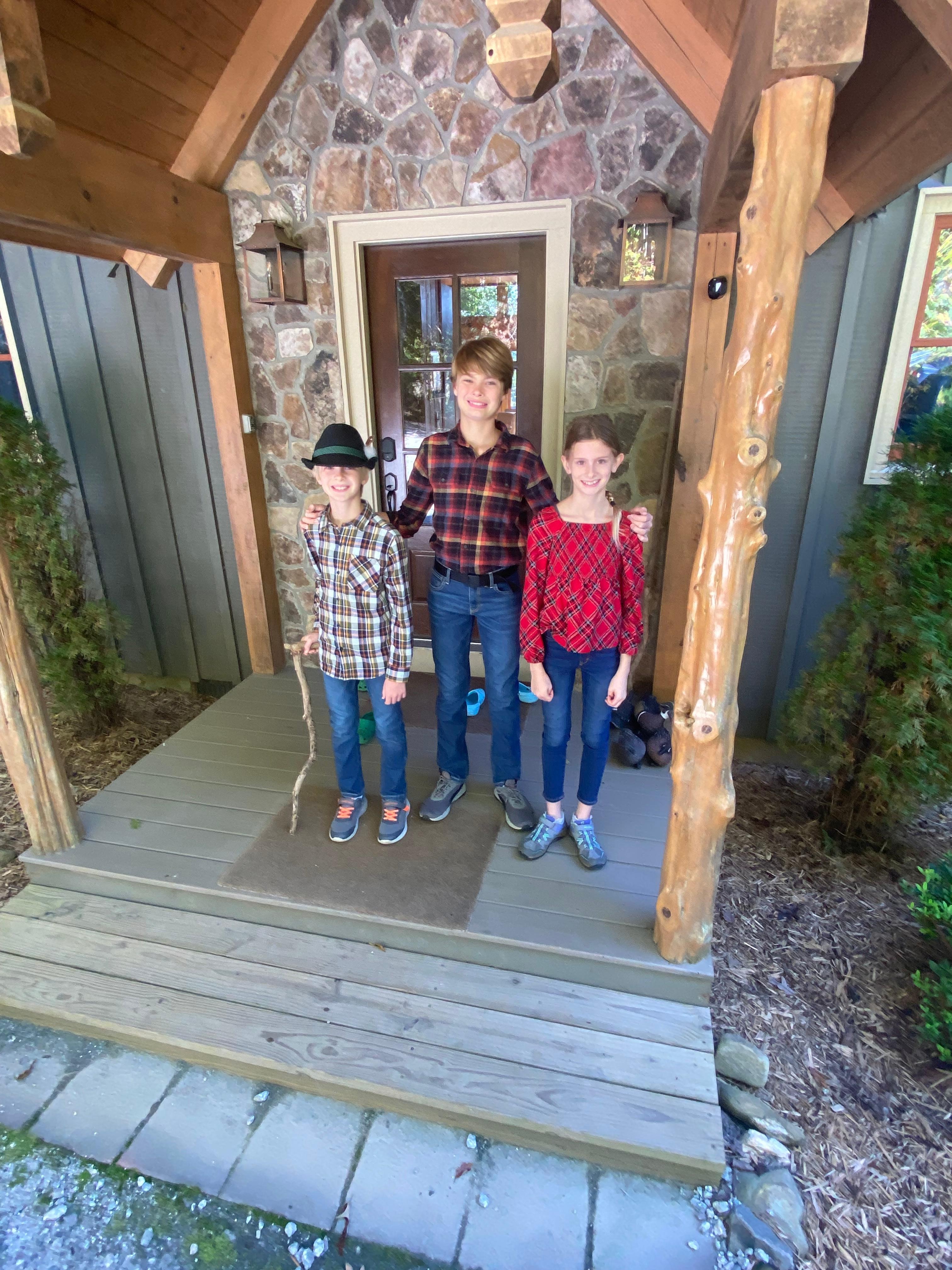 Kids on front porch ready for adventure