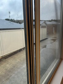 Open gap in window letting in bitter cold air