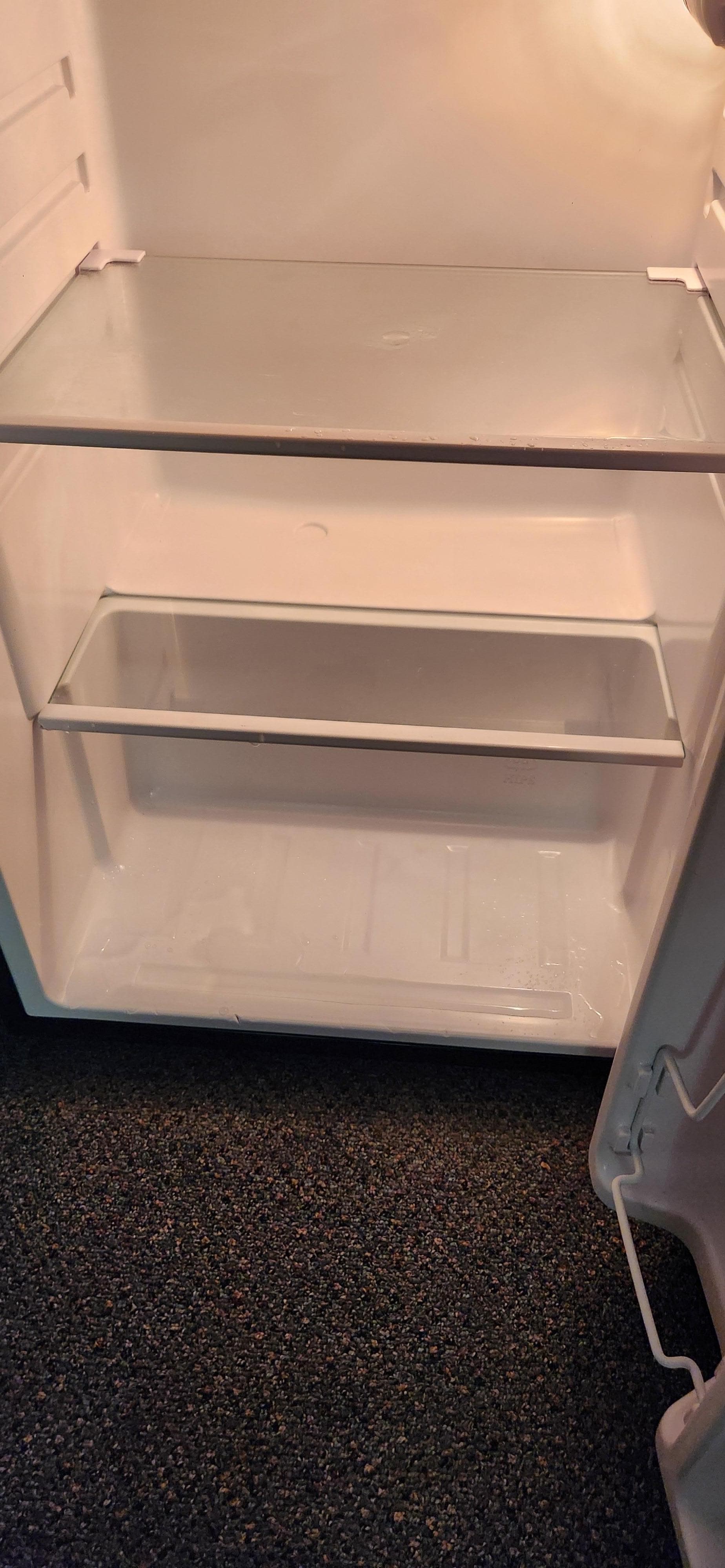 The fridge didn't work and was full of water.