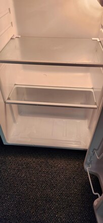 The fridge didn't work and was full of water.