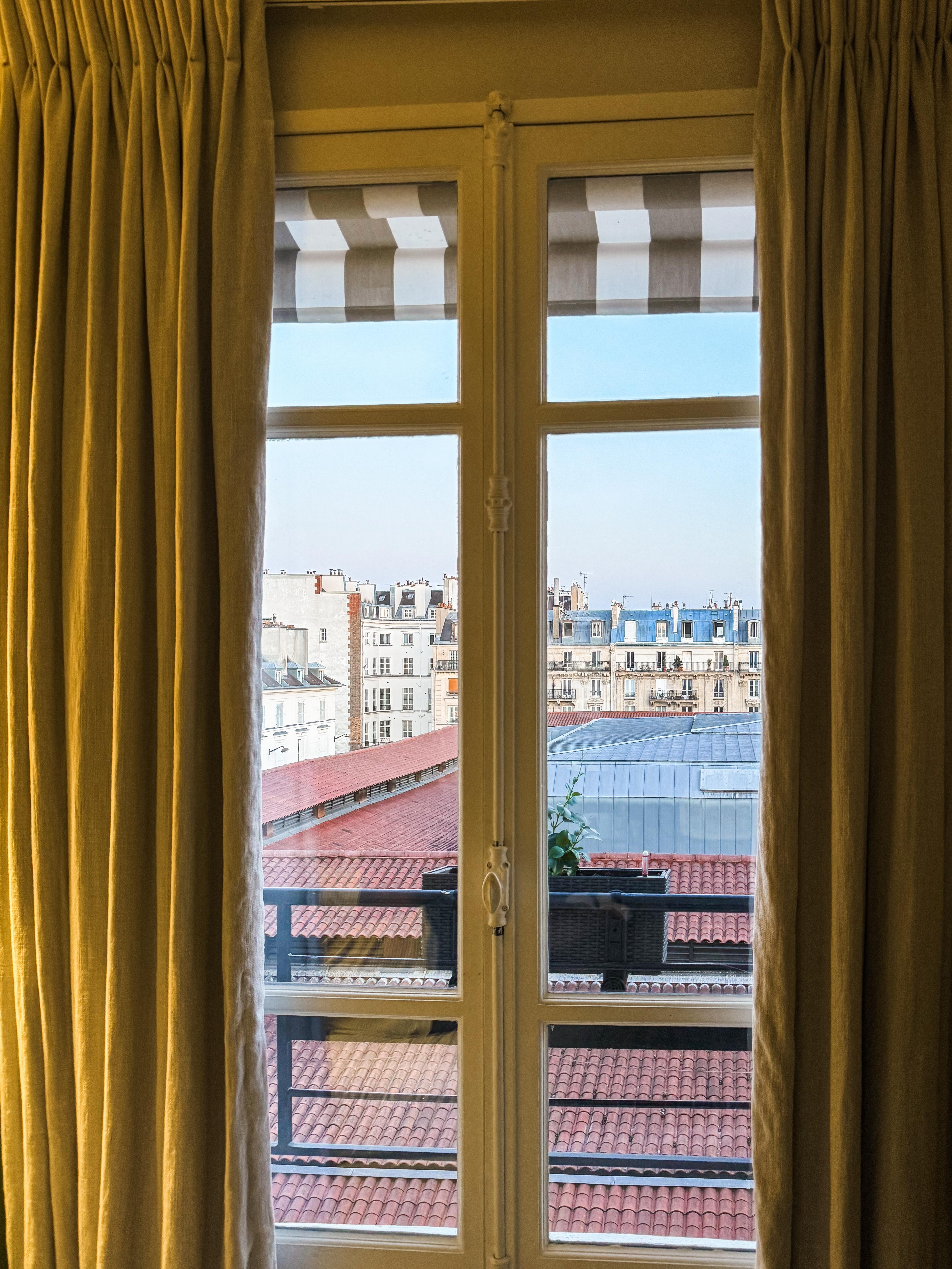 Inside room view of window. Gorgeous city view. 
