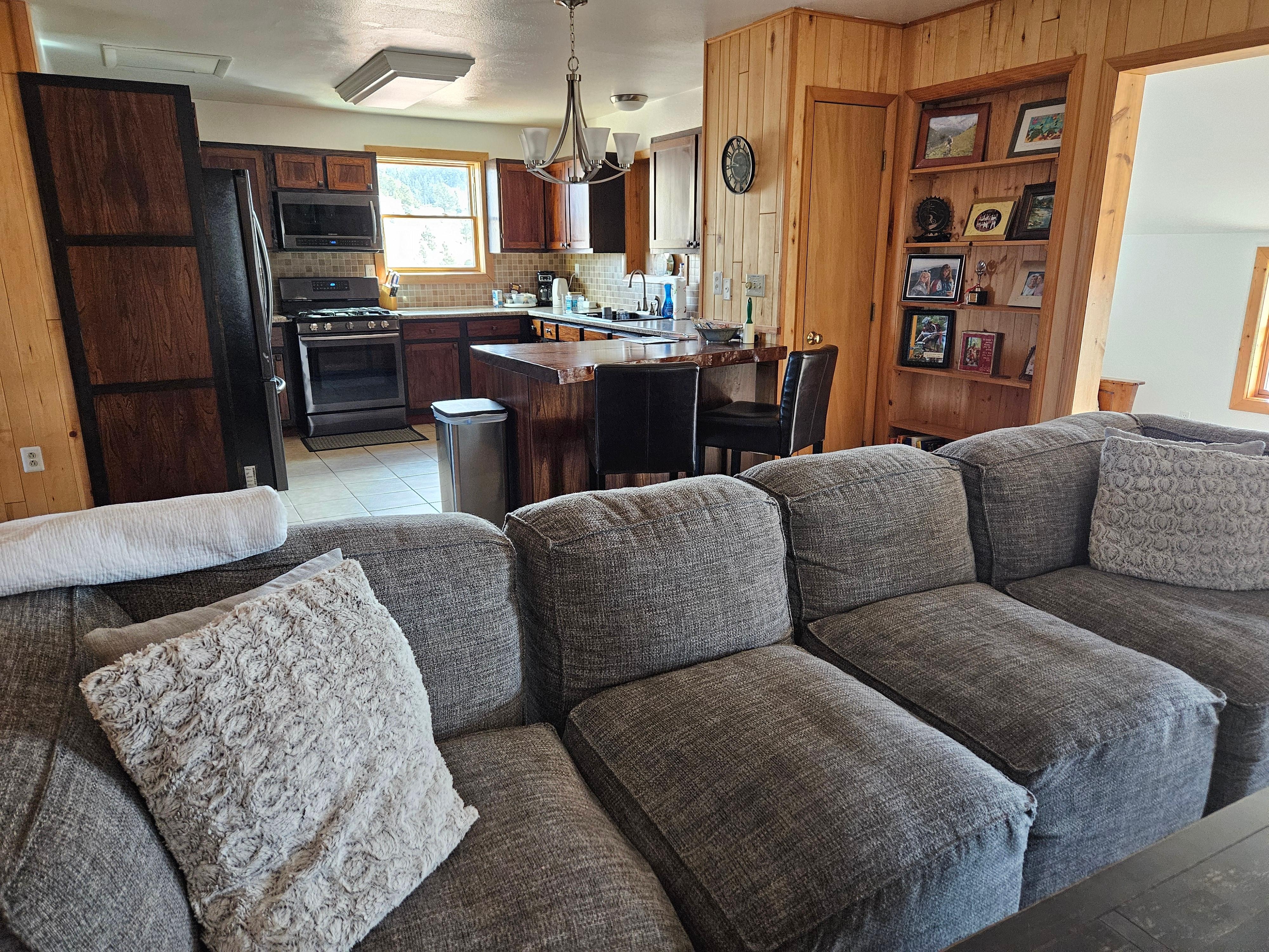 A lovely living room and kitchen. 