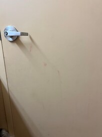 Look like blood on the bathroom door