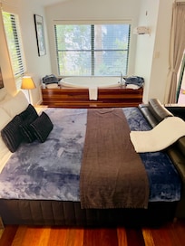 Comfy bed and jacuzzi tub