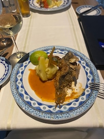 Dinner at El Pescador. Fried fish with mashed potatoes and zucchini and carrots