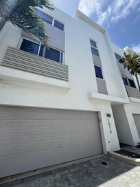Front entrance and garage of unit