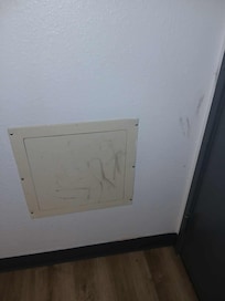 Filthy wall behind bathroom
