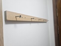 This is the coat hanger in the room.