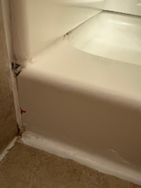 Blood found on left side bottom of bathtub