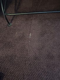 Torn carpet