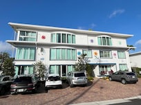 Front of building & parking